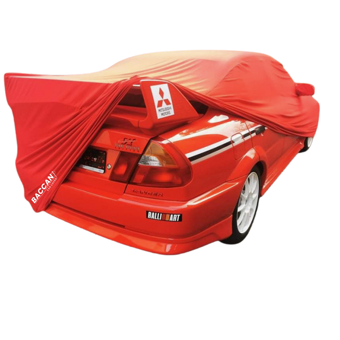 telo-copriauto-mitsubishi-lancer-evolution-5-6-su-misura-da interno-federico-baccan-2 Telo copriauto su misura mitsubishi lancer evo 5, 6 vista posteriore di lato mezza scoperta marchio federico baccan